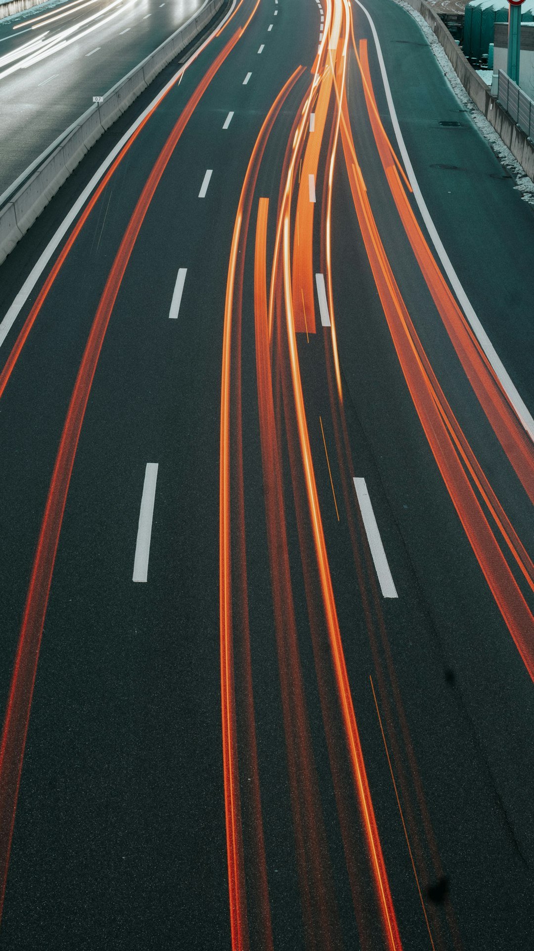 a-long-exposure-photo-of-a-highway-at-night-0gt1g22lnjq